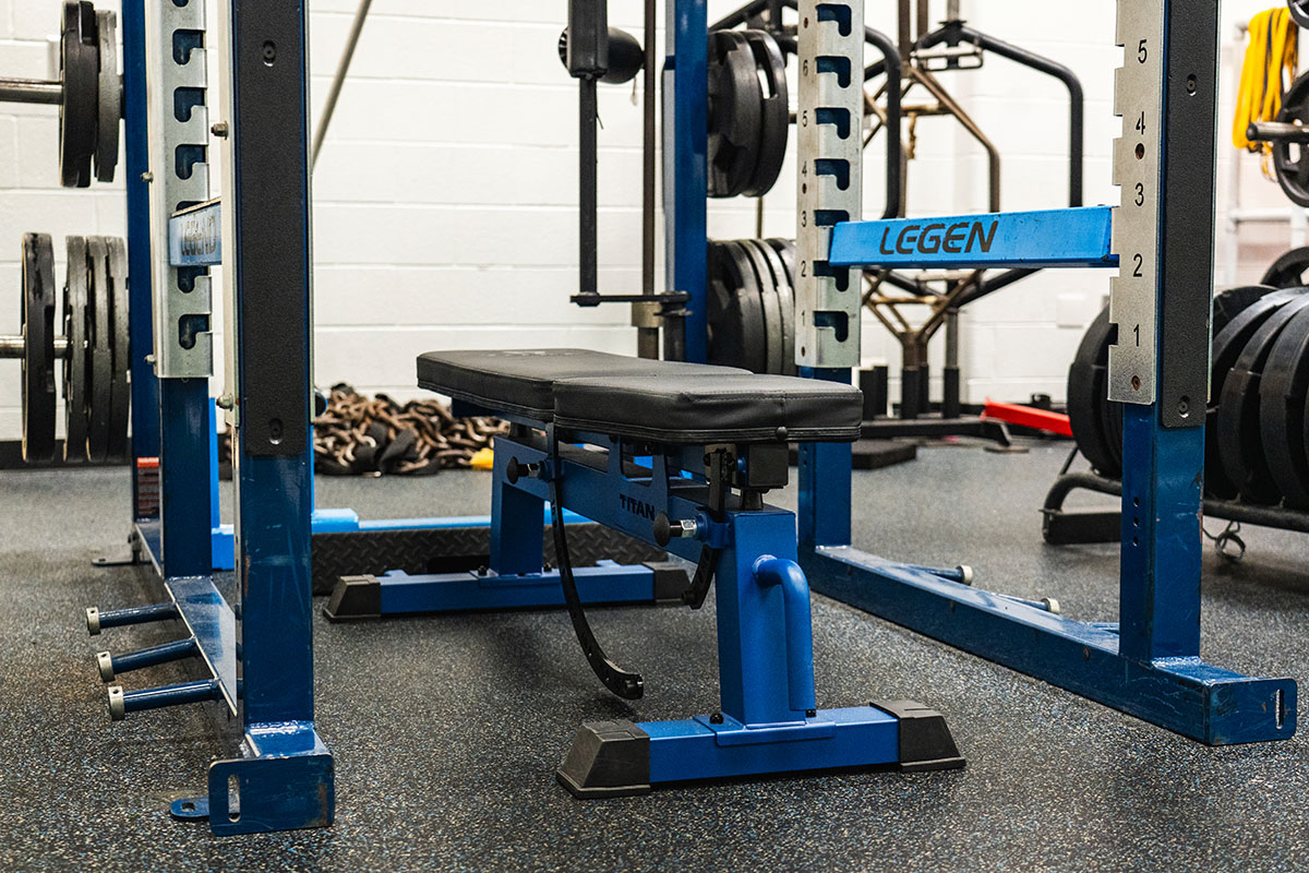 Row of new Titan benches in the upgraded Cambridge weight room