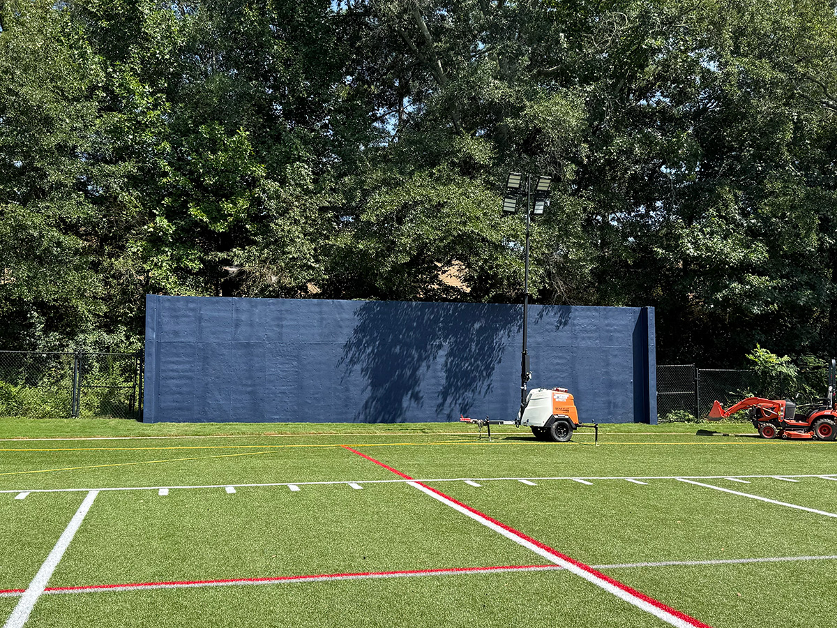 Practice field wall freshly painted Bear blue